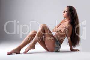 Image of charming topless brunette with long hair