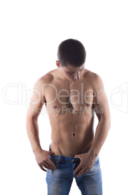 Portrait of sexy young man in jeans