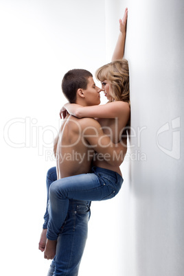 Young passionate couple of man and woman in studio