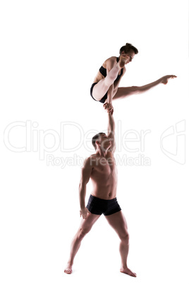 Young sporty people posing in studio