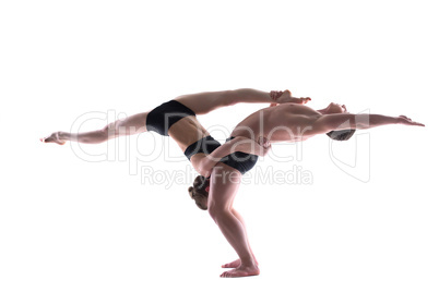 Young graceful gymnasts isolated on white