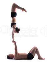 Image of young flexible people showing acrobatics