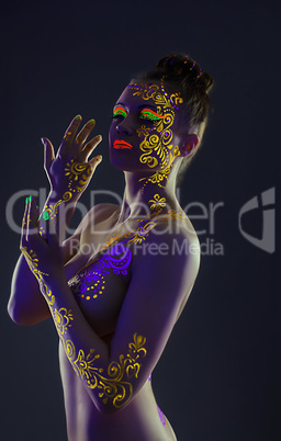Elegant model with yellow UV pattern on body
