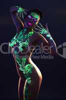 Image of sensual woman with UV glowing makeup