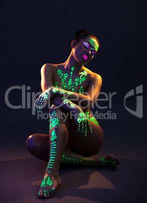 Graceful model posing with UV pattern on body
