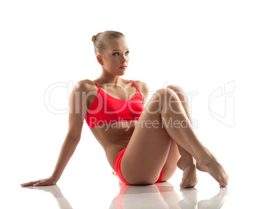 Athletic pretty girl posing in studio