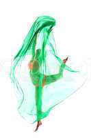 Slender young dancer jumping with green cloth