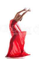 Graceful dancer posing nude with red cloth