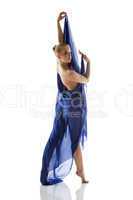 Beautiful slim model posing with blue cloth