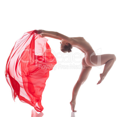 Passionate dancer posing with red cloth