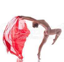 Passionate dancer posing with red cloth