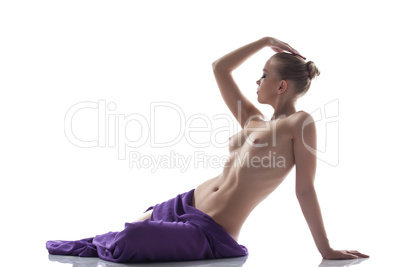 Pretty topless model posing with purple cloth