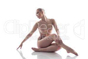 Impassioned naked woman isolated on white