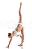 Pretty gymnast showing vertical split