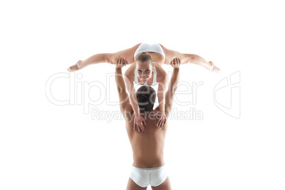 Smiling acrobat posing leaning on partner