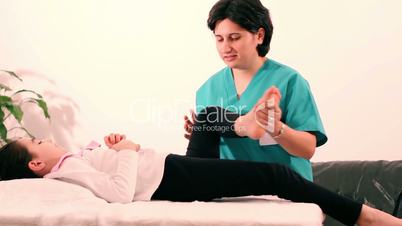 Physiotherapy for children to legs.