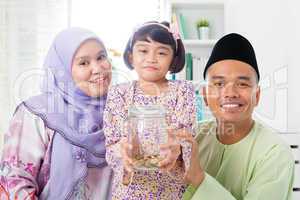 Malay family saving money