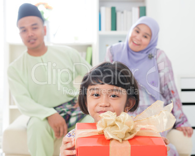 Southeast Asian girl with gift box