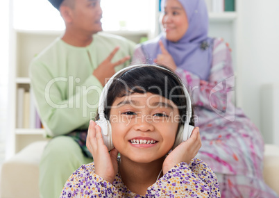 Muslim girl listening to song
