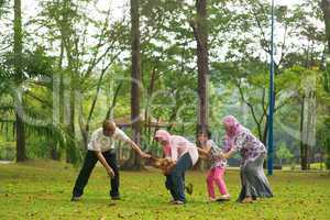Muslim family having fun at outdoor