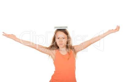 Child with a book on her head