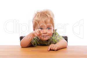 Little child pointing finger to someone