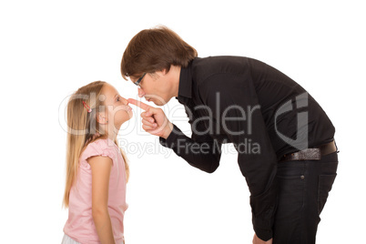 Despairing father pointing finger at his daughter