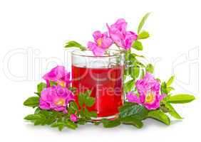 Rosa canina flowers with a herbal infusion
