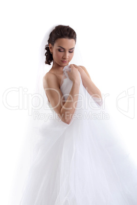 Portrait of beautiful model posing in wedding gown