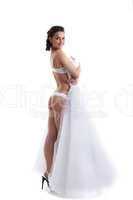 Sexy slim bride posing in white lingerie