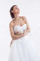 Image of nude bride covered by wedding dress