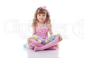 Image of cute little girl posing in candy costume