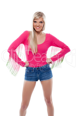 Portrait of young cheerful blonde posing in studio