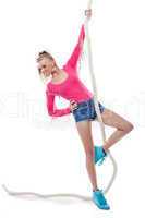 Sporty smiling blonde posing hanging on rope