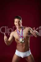 Smiling athlete poses with award-winning
