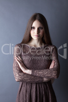 Lovely brunette posing in lace dress, close-up