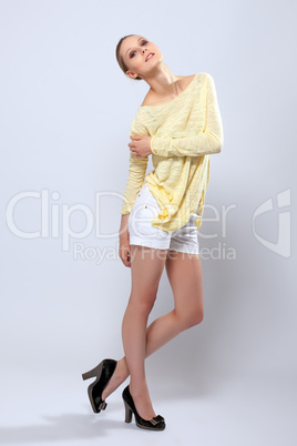 Smiling young model posing in casual clothes