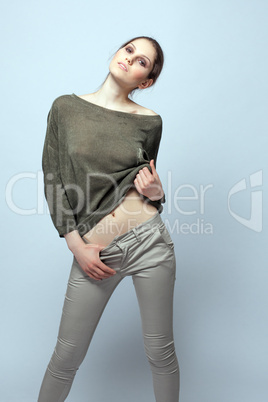 Sensual young woman posing in fashionable clothes