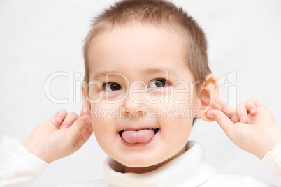 happy child showing tongue