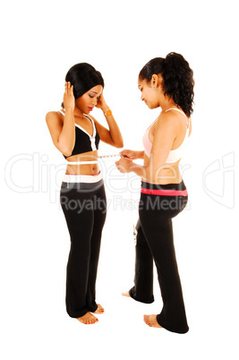Girls measuring stomach.