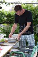 Man preparing plates