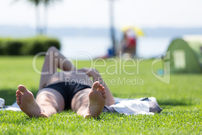 Man feet on grass