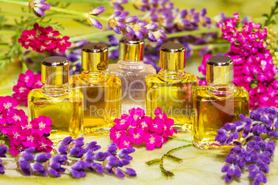 Fresh spring flowers with essential oil