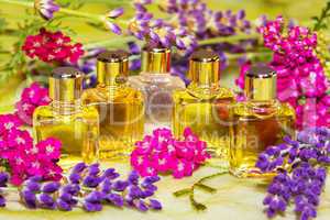 Fresh spring flowers with essential oil