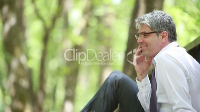 Handsome businessman talking on a mobile phone