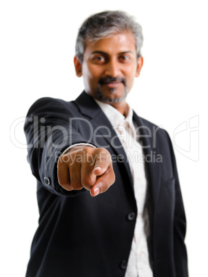 Asian Indian business man finger pointing at you