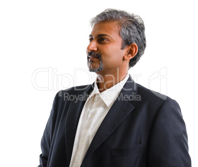 Indian business man looking at side