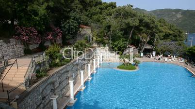 Panning the swimming pool and view on yachts harbor, Marmaris, Turkey