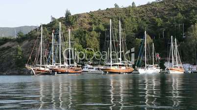 Yachts at the pier on Mediterranean turkish resort, Fethiye, Turkey