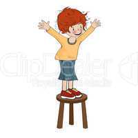 funny little boy perched on chair